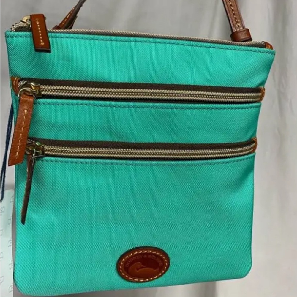 Dooney & Bourke mint green crossbody nylon purse.